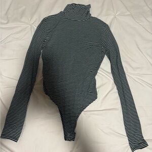 Double Zero Women’s long sleeve turtle neck Body suit!